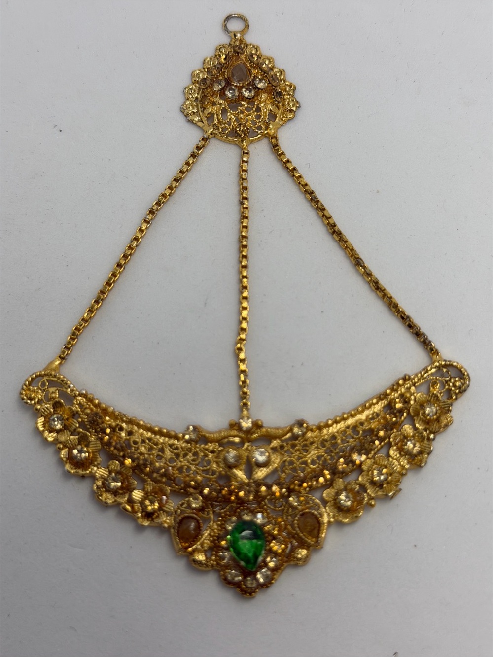 Gold-Tone Floral Pendant with Green Gem